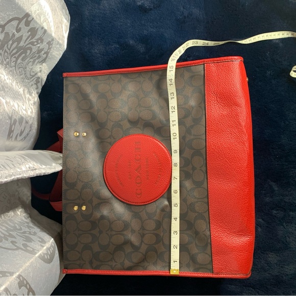 Brown trimmed in red coach duffel overnight work school bag Excellent condition